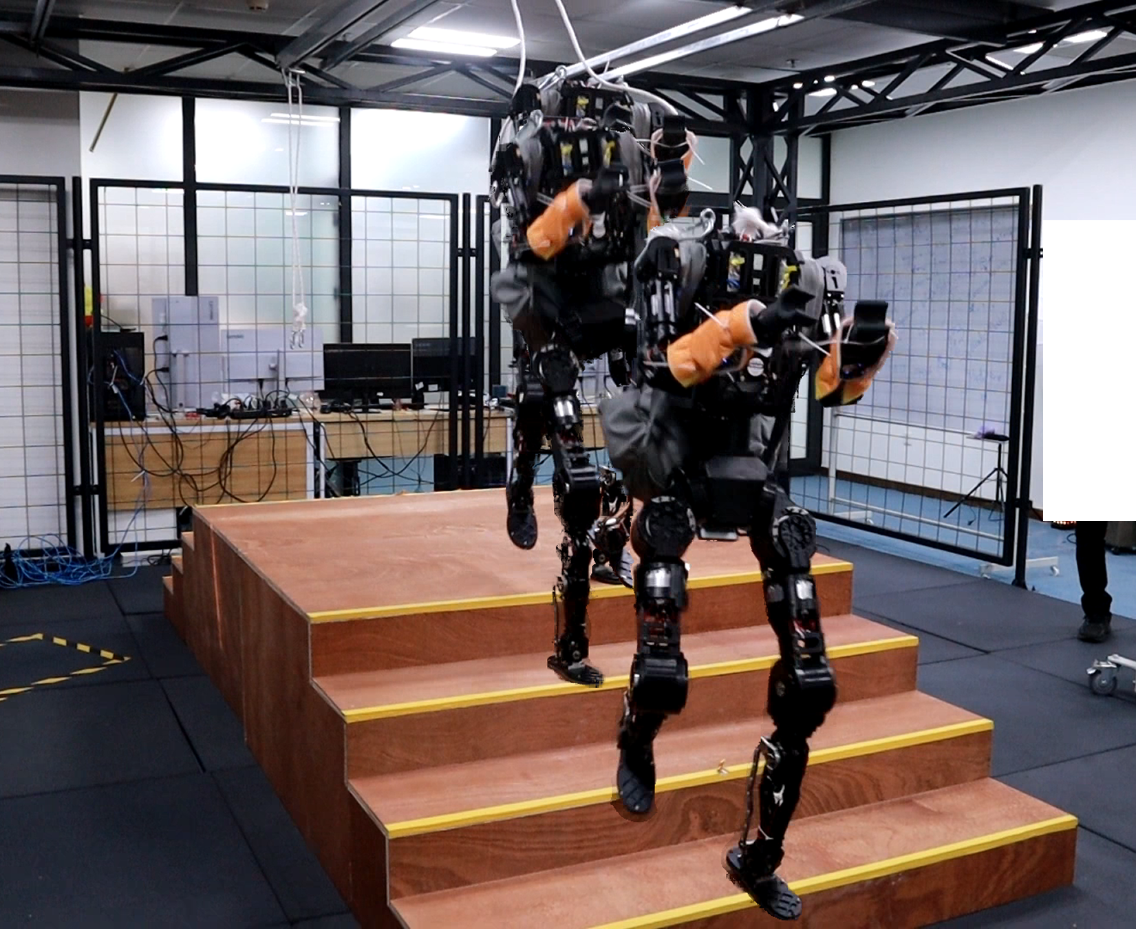 Real robot descending stairs